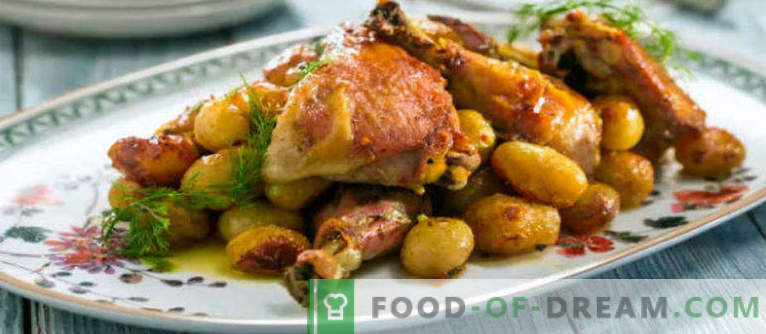 Cuisse de poulet, cuite au four avec des pommes de terre au four, sous une croûte croustillante, dans un fourreau, une feuille, avec du fromage