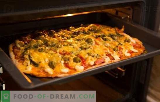 La recette de la pizza au four est un plat préféré de la maison. Recettes de pizza au four: avec du fromage, des champignons, du jambon, des fruits de mer