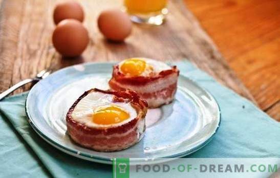 Œufs au plat avec du bacon - le meilleur invité de la cuisine maison. La surprise est difficile, il est facile à nourrir: fantaisie dans les plats de bacon et d’œufs